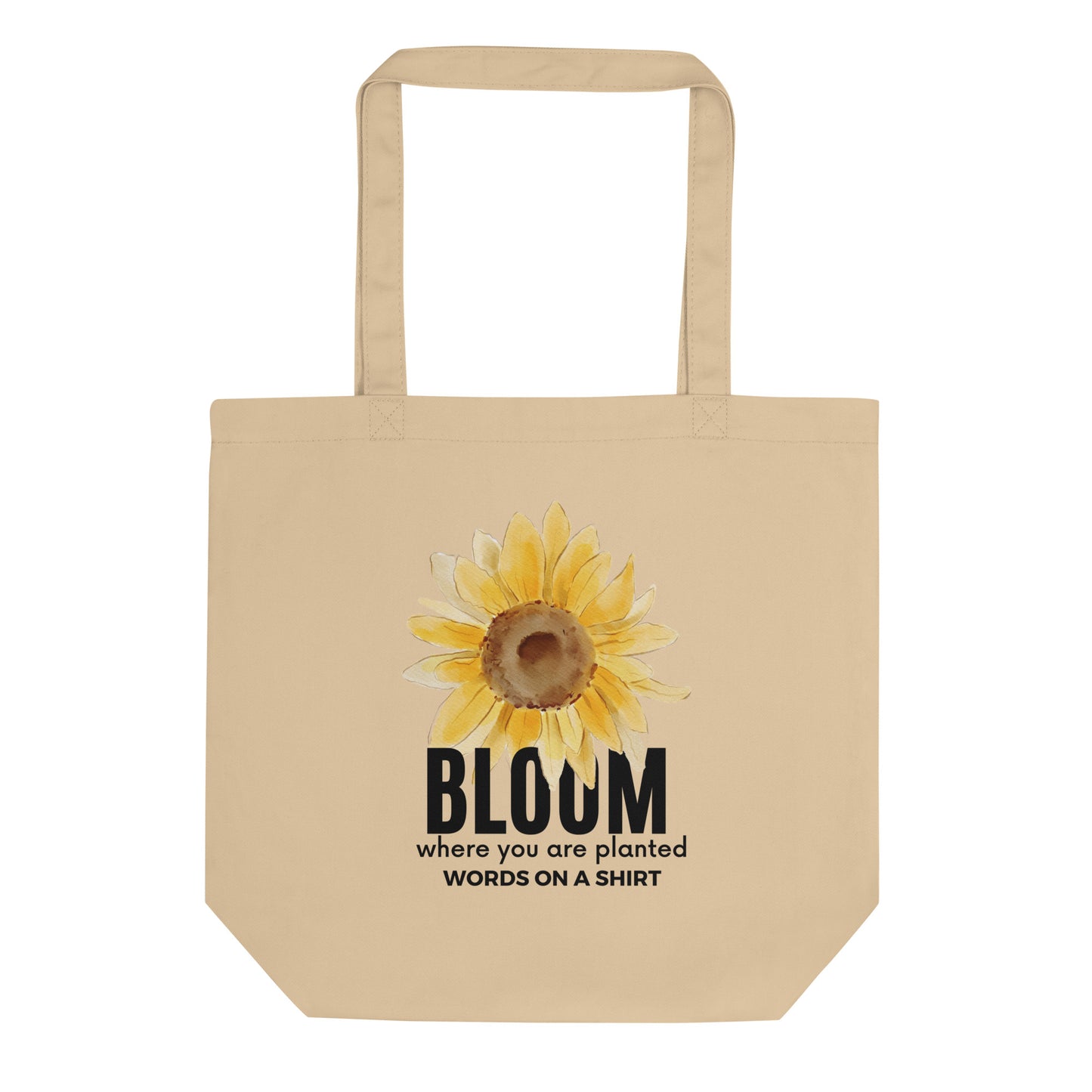 Pack your goodies in our Bloom Where You Are Planted- Eco Tote Bag for your wildest grocery excursions, library runs, or everyday escapades. This all-natural cotton tote is a planet-friendly substitute for plastic, and it fits just the right amount. Take a stand against plastic and let your roots grow deep!