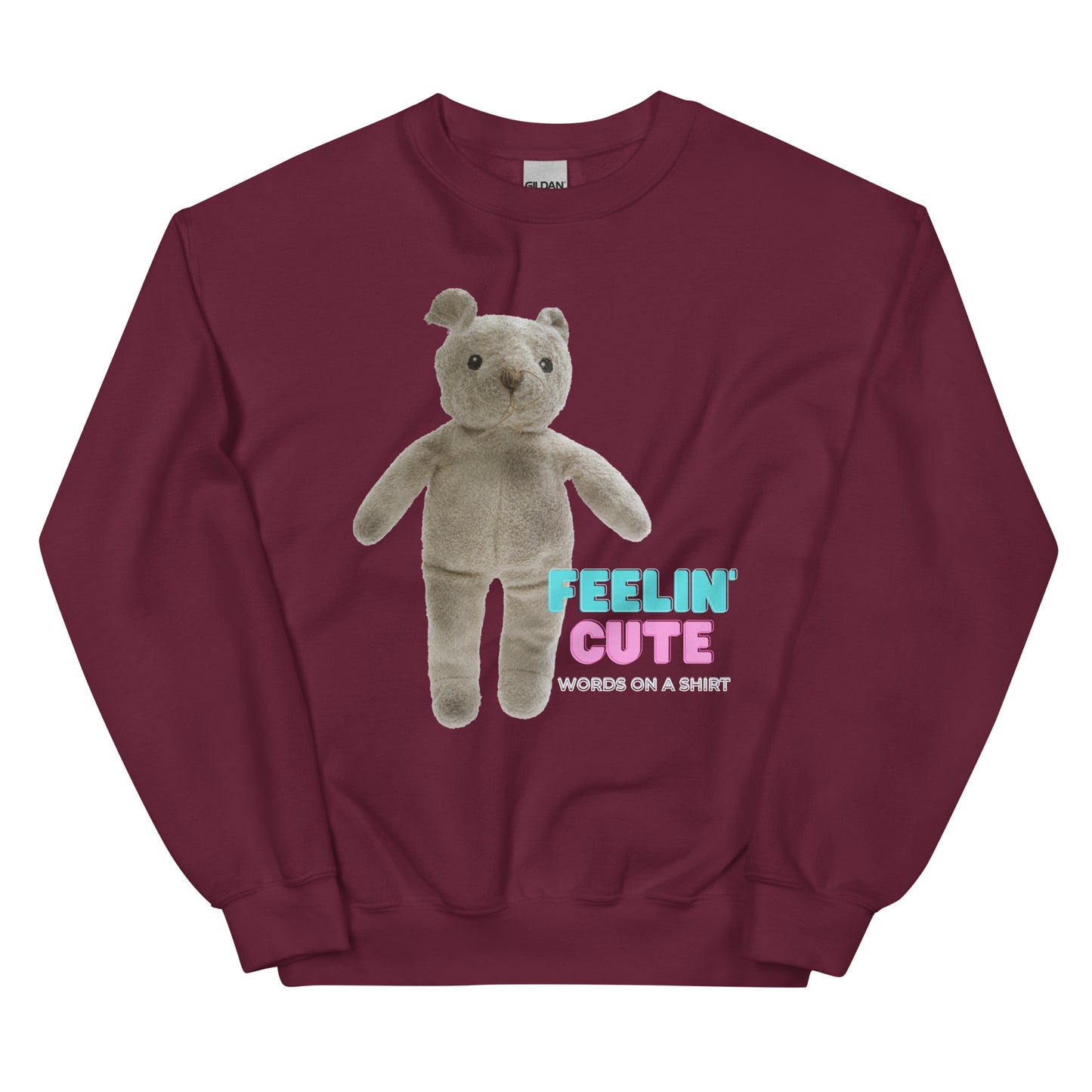 Stay cozy and stylish all winter long with this sturdy and warm sweatshirt. It's pre-shrunk and has a classic fit, plus the air-jet spun yarn gives it a soft touch. Get ready to feel cute with the Feeling' Cute Teddy sweatshirt!