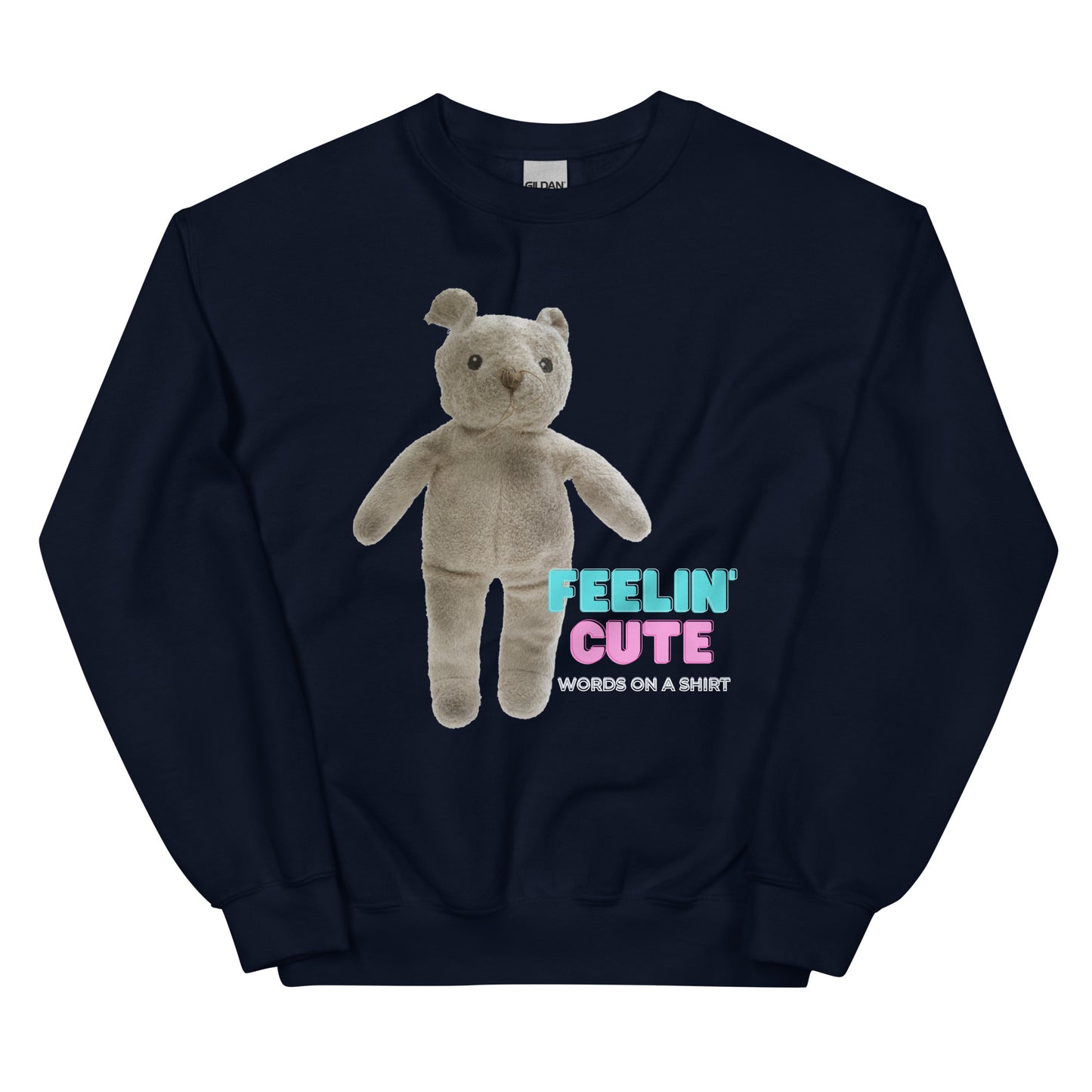 Stay cozy and stylish all winter long with this sturdy and warm sweatshirt. It's pre-shrunk and has a classic fit, plus the air-jet spun yarn gives it a soft touch. Get ready to feel cute with the Feeling' Cute Teddy sweatshirt!