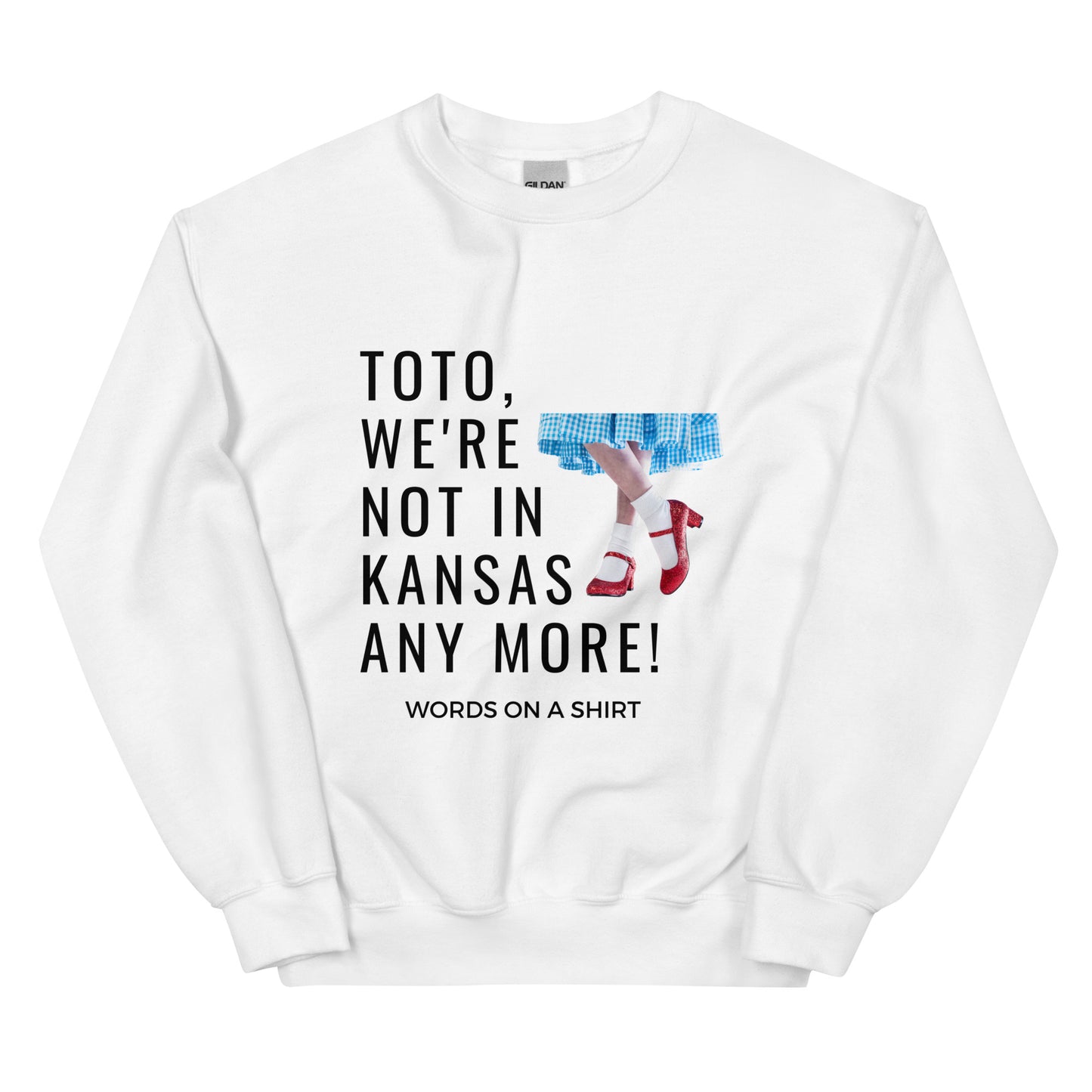 Cozy up in this durable and snug sweatshirt, perfect for chilly days. This pre-shrunk, traditional cut sweater features air-jet spun yarn for a cozy touch and less pilling. And with the iconic quote from The Wizard of Oz, "Toto, We're Not In Kansas Anymore," you'll be ready for any adventure!