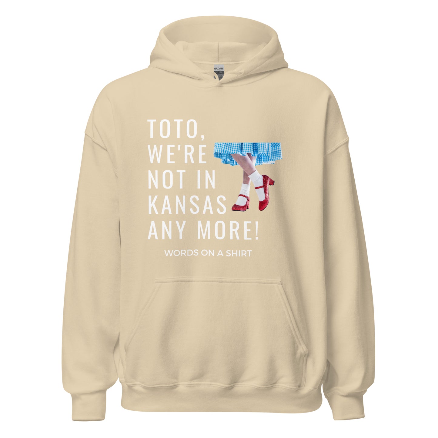 Get your hands on a cozy go-to hoodie that'll keep you comfortable and looking cool. Perfect for those chilly nights! Featuring the famous Wizard Of Oz quote, "Toto, We're Not In Kansas Anymore."