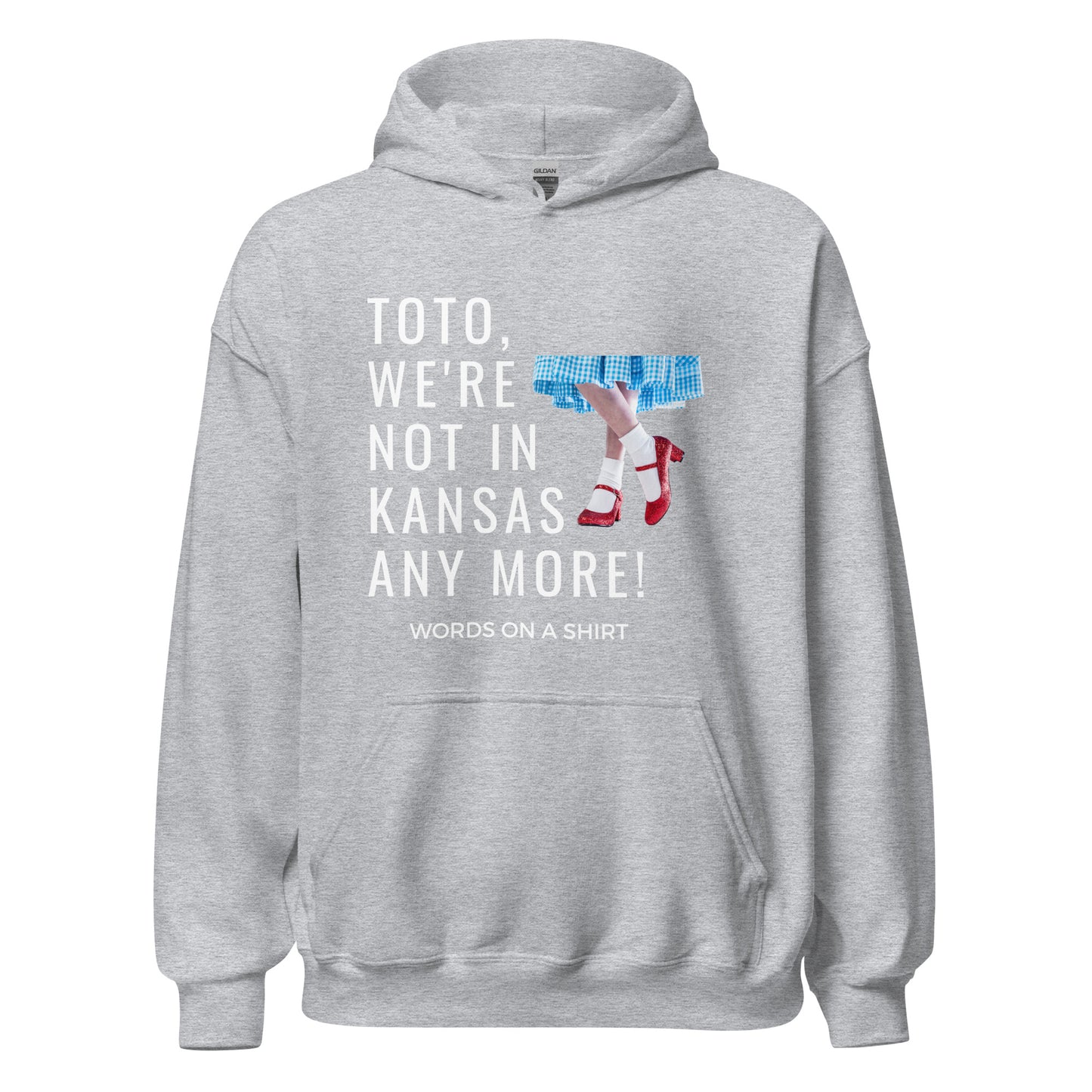 Get your hands on a cozy go-to hoodie that'll keep you comfortable and looking cool. Perfect for those chilly nights! Featuring the famous Wizard Of Oz quote, "Toto, We're Not In Kansas Anymore."