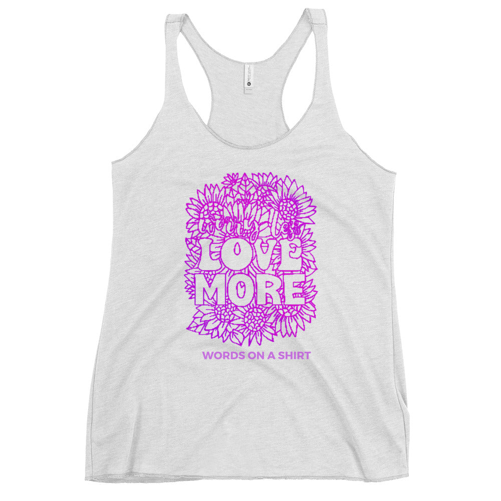 This racerback tank is designed for comfort, featuring a soft and lightweight fabric that hugs your body with a flattering cut and edgy raw edge seams. Embrace the message of Love More with every wear.