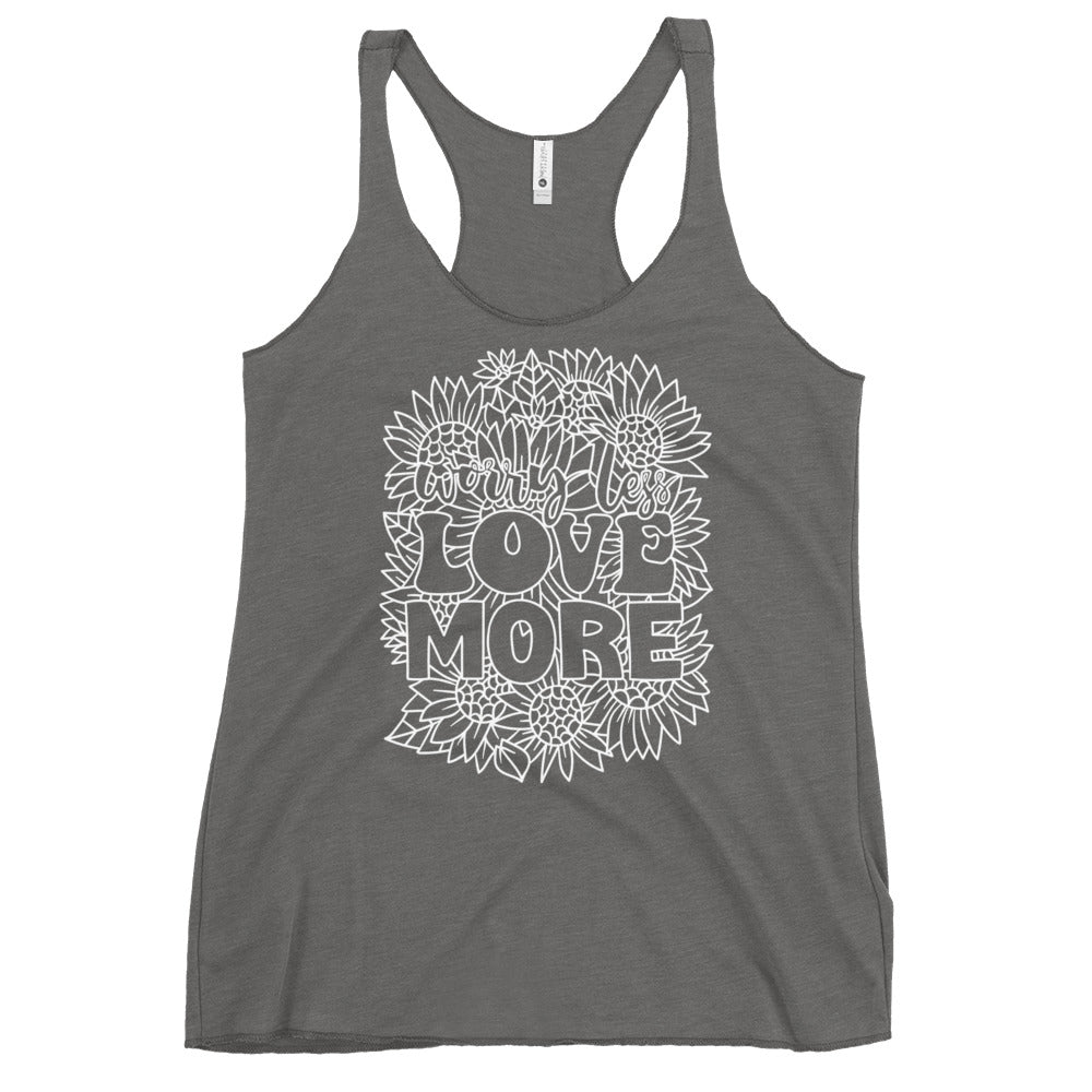 This racerback tank is designed for comfort, featuring a soft and lightweight fabric that hugs your body with a flattering cut and edgy raw edge seams. Embrace the message of Love More with every wear.