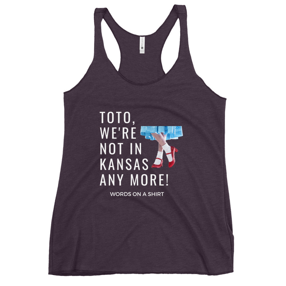 This racerback tank is soft, lightweight, and form-fitting with a flattering cut and raw edge seams for an edgy touch. The Wonderful Wizard Of Oz famous quote-"Toto, We're Not In Kansas Anymore"