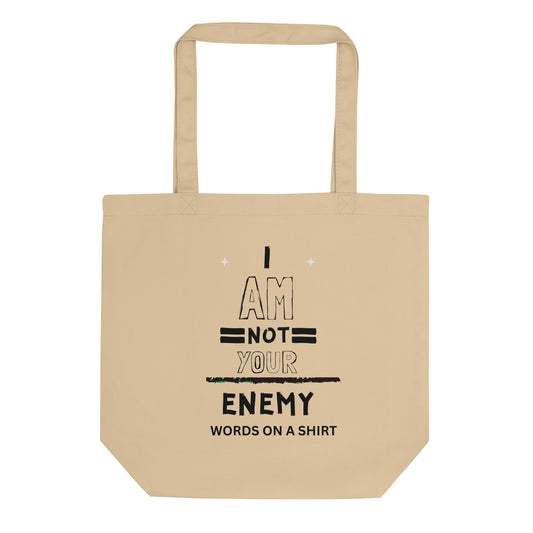 Forget plastic and tote your things in style with this organic cotton tote bag. Carry all your must-haves, groceries, and books - without a single enemy in sight!