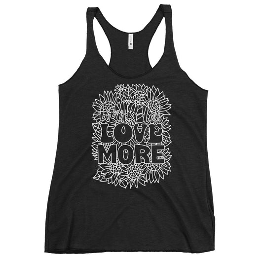 This racerback tank is designed for comfort, featuring a soft and lightweight fabric that hugs your body with a flattering cut and edgy raw edge seams. Embrace the message of Love More with every wear.
